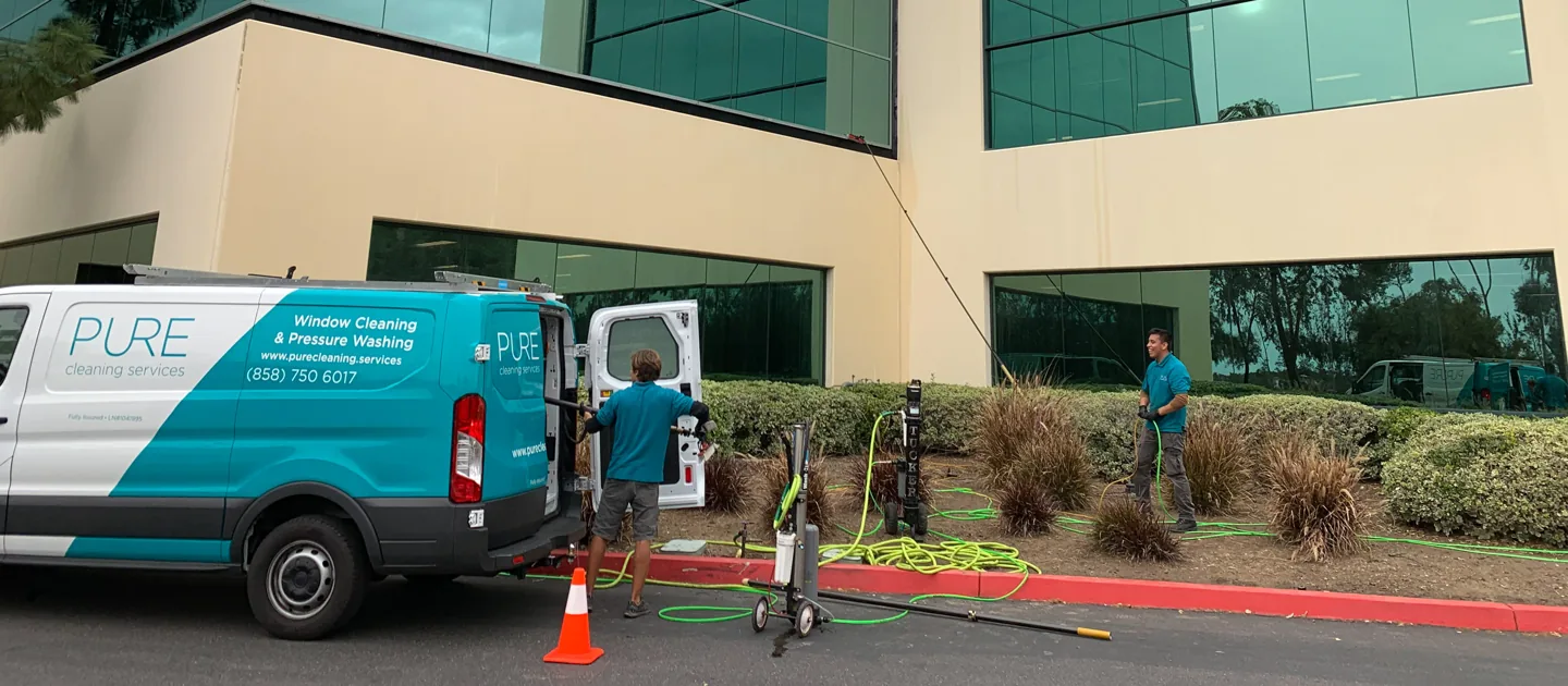 PCS crew and branded van at a commercial office-building project