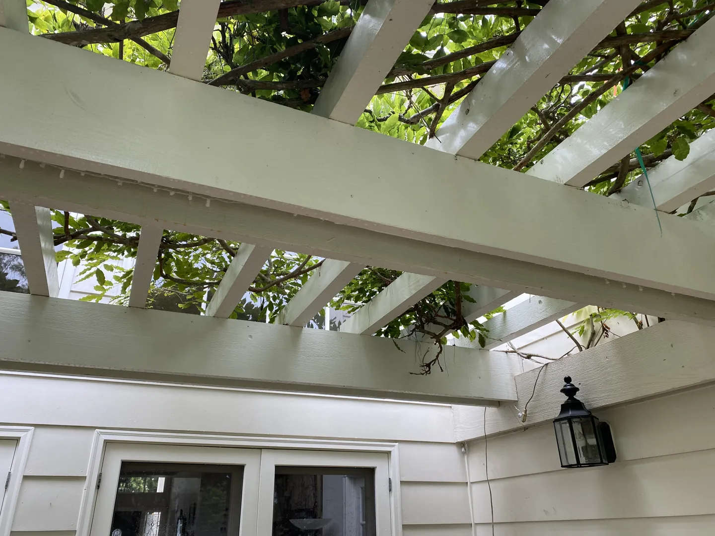 The same pergola beams after cleaning